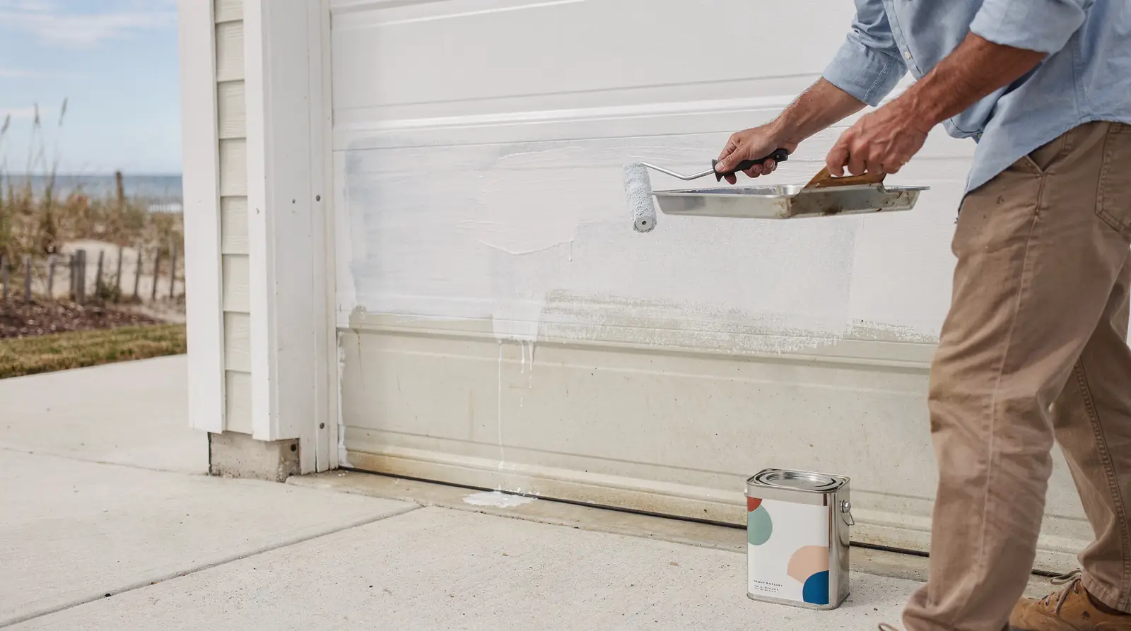 Regularly rinsing the door with fresh water helps remove salt buildup; once a month